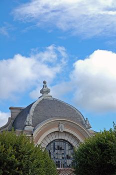 roof church over blue sky in belfort, france