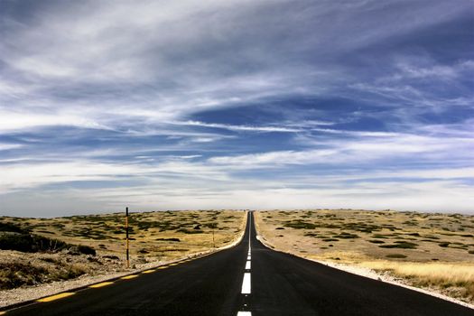 Landscape with a road ending on the horizon