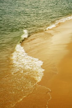 sea wave at sea shore during sunset evening