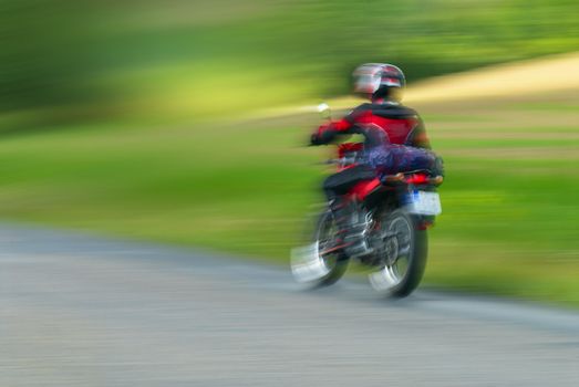 The motorcyclist photographed during high-speed movement