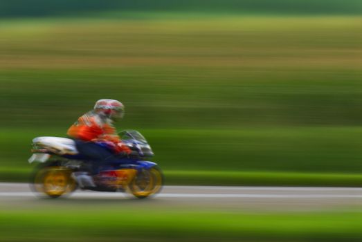 The motorcyclist photographed during high-speed movement