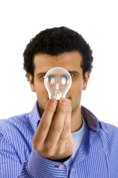man with light bulb on hand - focus on lamp
