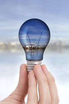 hand with light bulb