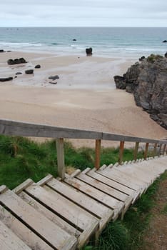 wooden stairs to a rocky beach in northern Scotland