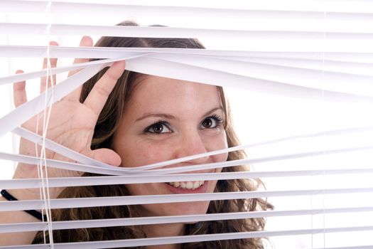 woman hands apart on the window blinds
