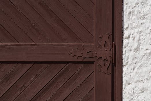 Part of a rural gate with  forged metal staple