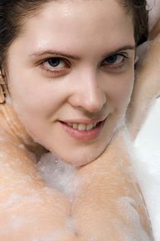  woman enjoys the bubble-bath