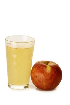 Apple wine in a glass with an apple on white background