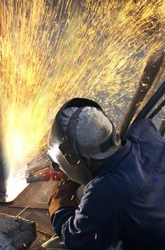 a arc welder busy at work 