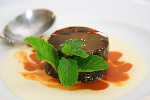 flourless chocolate cake served with  mint
