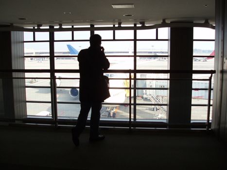 using a mobile phone before boarding a flight