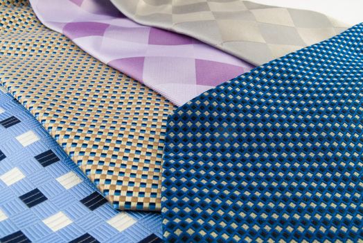 Close Up Neck Ties Showing Silk Pattern on Rich Cloth