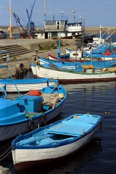 Fishing boats resting in the Black Sea of Sozopol harbour in Bulgaria.  