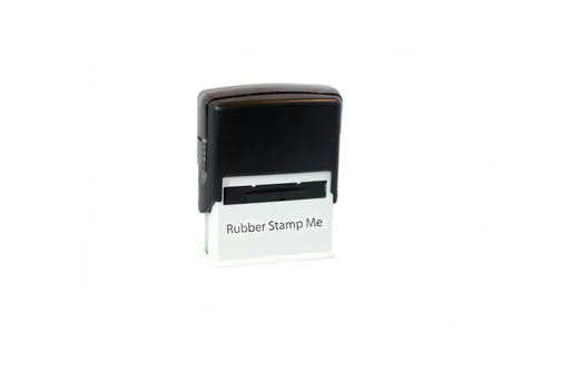 A photograph of an isolated rubber stamp printed with the text Rubber Stamp Me