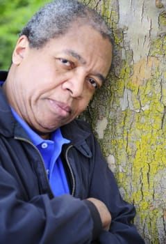 African american man relaxing in the woods.