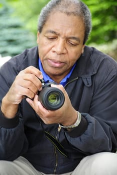 African american photographer on assignment.