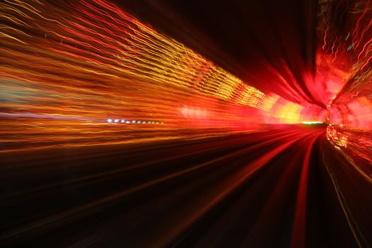 abstract background with light waves in deep tunnel turning right