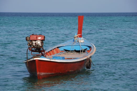 Longtail boat on a beach