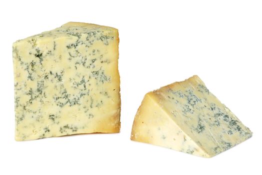 Two sections of Stilton cheese on white background.  Clipping paths included.