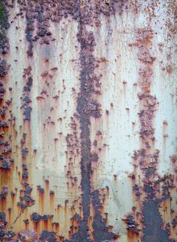 The red rusty old metal wall