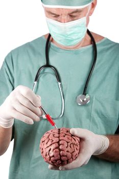 A 60 year old surgeon holding a brain, isolated on a white background.