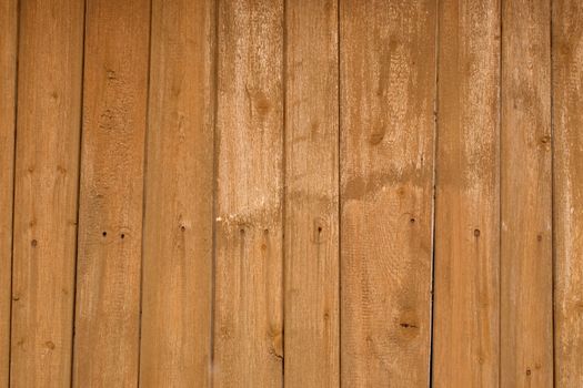 Wooden wall of yellow color