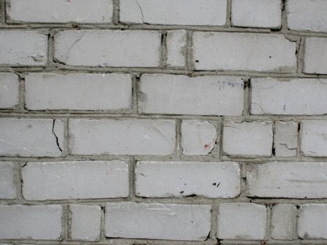 Old brick wall of white color