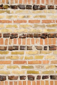 extraordinary wall made of different bricks