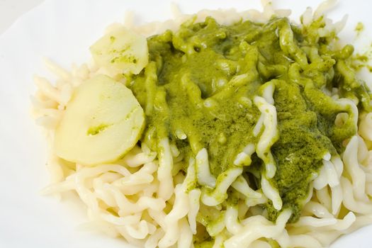 typical Ligurian food often accompanied by potatoes or green beans. Pesto is a sauce made of basil, parmesan and pine nuts