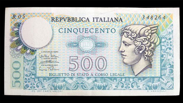 five hundred lire Italian banknote isolated on black background