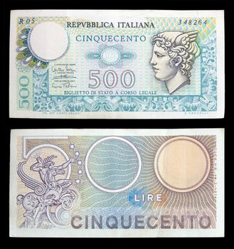 five hundred lire Italian banknotes isolated on black background