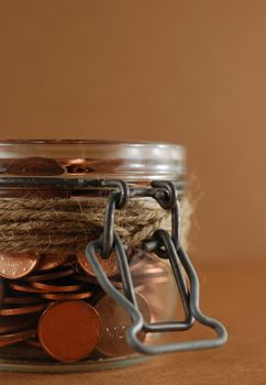 Glass Jar of coins. Savings Concept