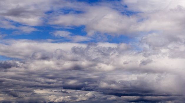 The beautiful blue sky with cumulus clouds