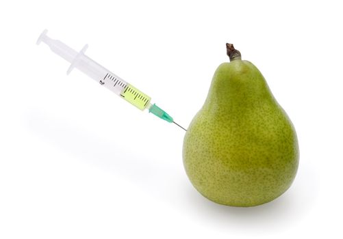 Pear with the punctured syringe sideways on a white background