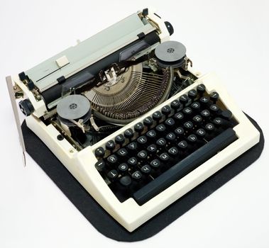 Old ancient typewriter on a white background