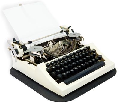 Typewriter with the inserted leaf of a paper in the carriage