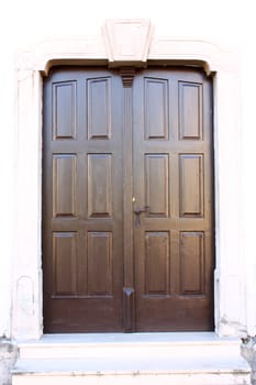 Old wooden entrance door in a house