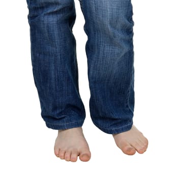 Female legs in jeans on a white background