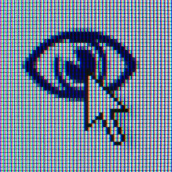 Macrophoto of a matrix of the monitor with an icon and the cursor