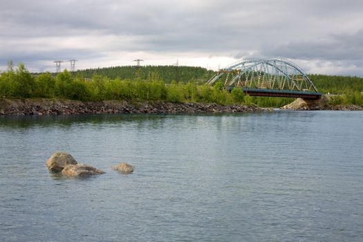 The metal bridge through passage of lake