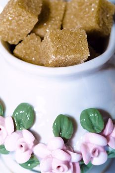 close-up of cup full of brown sugar