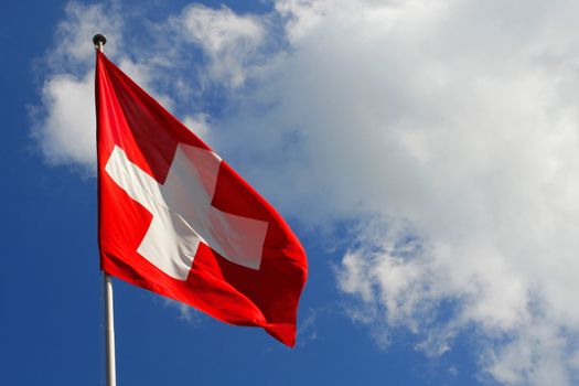 National flag of Switzerland blowing in the wind.
