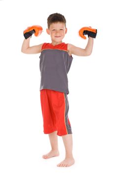 Young champion boy with orange boxing gloves