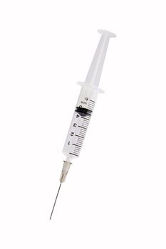 A syringe with needle over white background