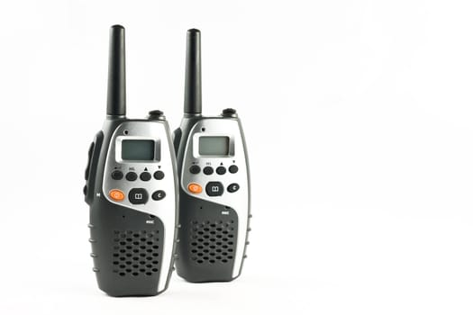 Two walkie talkies isolated on a white background