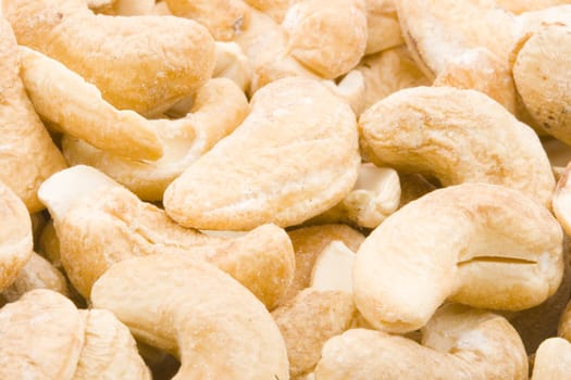 A close-up of a group of cashew nuts.