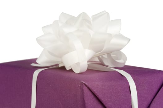 a closeup of a present with a bow