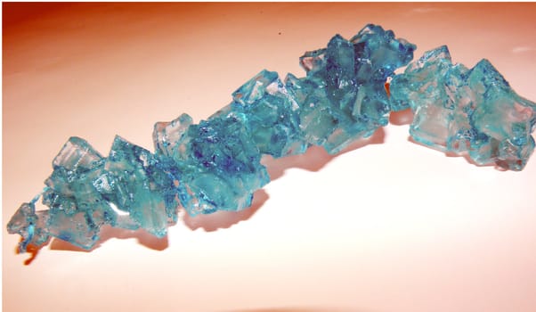 a stricng of teal/ turqoise rock candy.