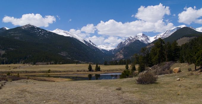 Wide valley under mountains in the Colorado Rockies