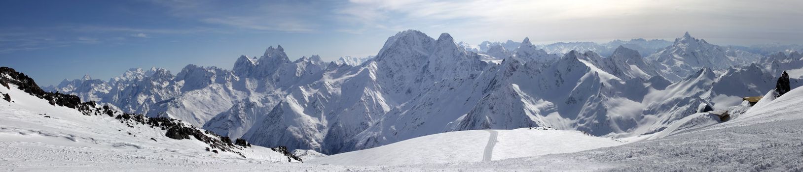 Russia. Caucasus. View on Elbrus Mount - the highest point of Europe from Cheget Mount. Panorama the review from 6 shots